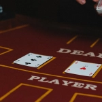Игрок проигрывает в блэкджек в казино